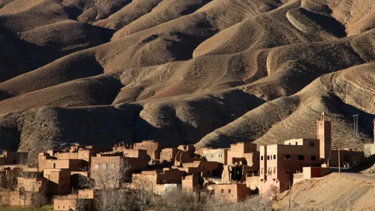 A traditional village in Morocco’s Dades Valley surrounded by rugged gorges and rock formations shaped by the Dades River.