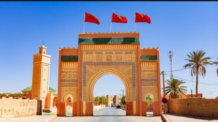 The ornamental gate of Rissani stands in eastern Morocco, a cultural landmark often visited during a Marrakech to Fes desert tour 4 days.