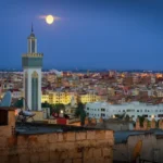 Moroccan city night view with full moon