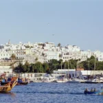 Tangier port with fishing boats and white city